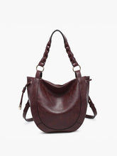 Load image into Gallery viewer, Brown leather handbag with braided handle on a white background