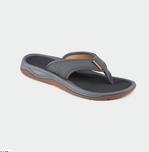 Load image into Gallery viewer, A dark grey flip flop sandal with a SeaDek footbed and razor-siped outsole by grundens.