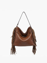 Load image into Gallery viewer, Brown leather handbag with fringe details on a white background
